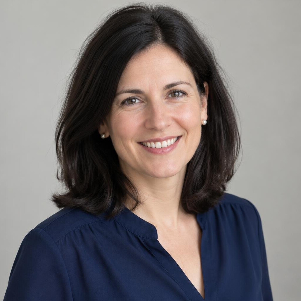 Woman with dark hair smiling portrait
