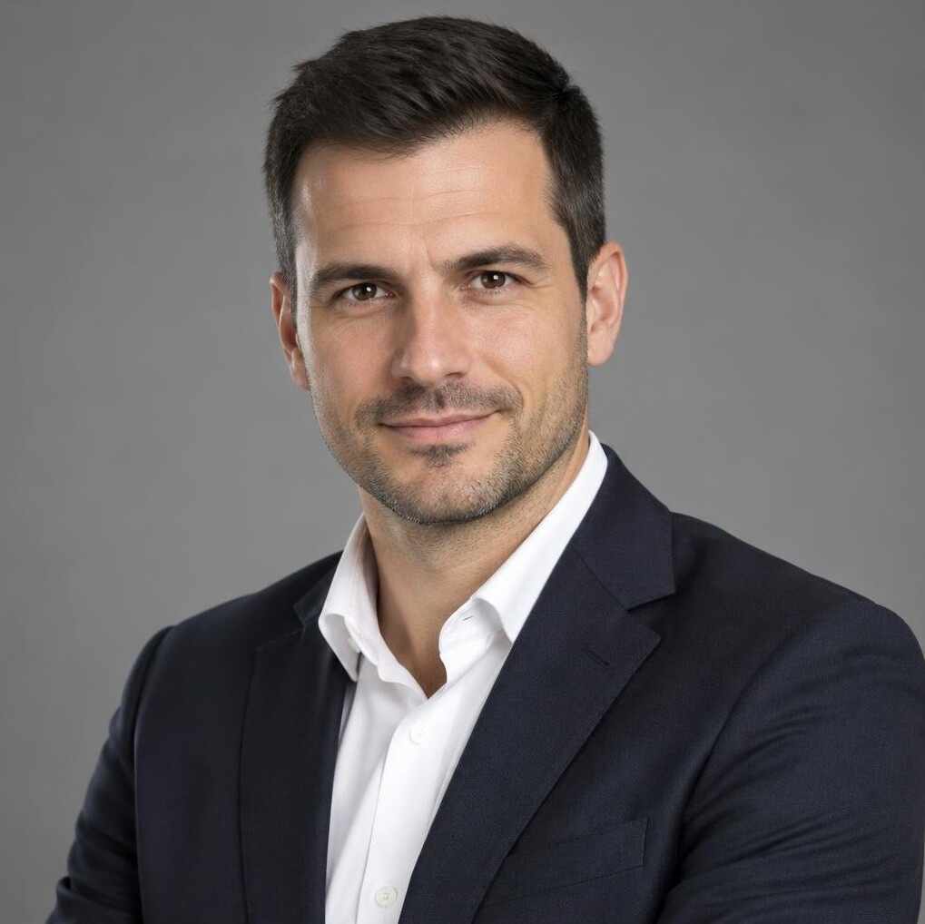 Man in dark suit portrait with confident look