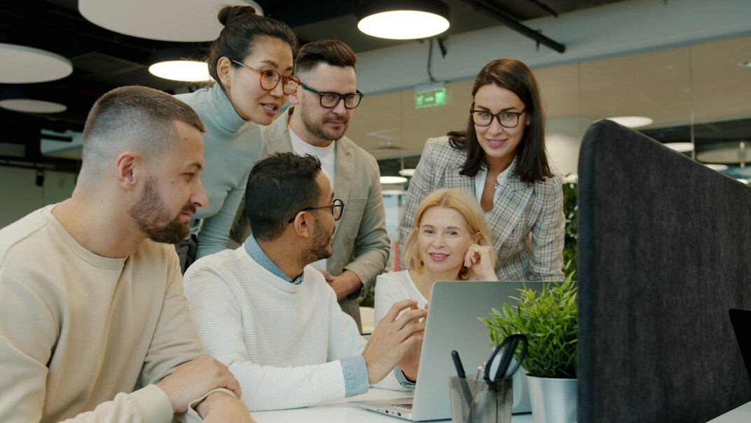 team discussing emails